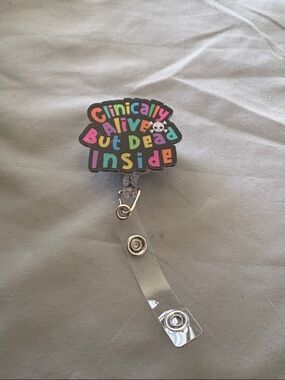 Colorful "Cynically Alive But Dead Inside" Badge Reel
